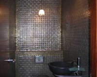 Aseo con pared gresite